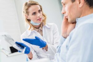 TMJ Specialist from TMJ Care in Tucson providing TMJ treatment to a patient